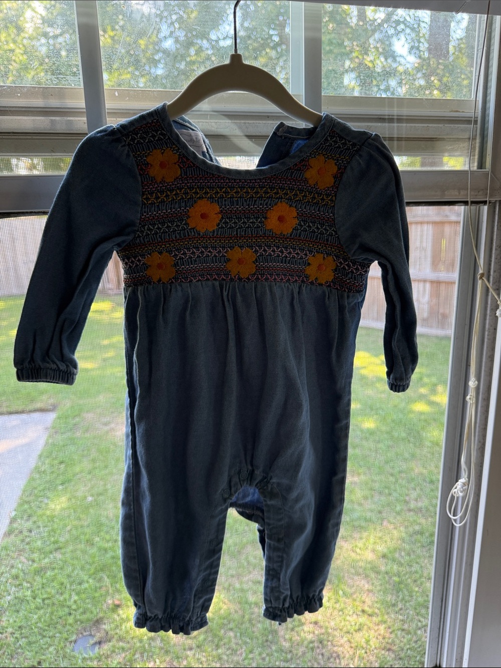 Mud Pie Blue Long-Sleeve Smocked One-Piece with Yellow Floral Embroidery